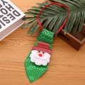 Green sequined Christmas tie with Santa Claus figure on a wooden background - Non-Luminous / Santa Style