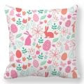 Detail showing Easter bunny and colorful egg patterns on soft peach skin pillow cover - 18x18 Inch / Coral Easter Floral Rabbit