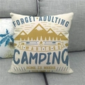 Close-up of linen camping pillowcase with mountain and campfire print on grey sofa - Forget Adulting Camping (Style 10)