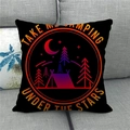 Detail of Happy Camper linen cushion cover featuring a colorful tent and stars on a sofa - Take Me Camping Black (Style 16)