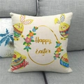 Close-up of Happy Easter linen pillowcase with colorful rabbits and eggs on a grey sofa - Four Rabbits in Colorful Clothes (4)