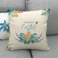 Detail of Happy Easter pillowcase featuring colorful eggs on a grey fabric sofa - Fresh Floral Eggs (7)