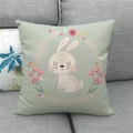 Linen Easter pillow cover detail with cute bunny and floral wreath on sofa - Light Green Base Tulip Bunny Style (8)
