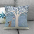 Linen pillowcase featuring an Easter rabbit illustration on a modern gray fabric sofa - 45x45cm