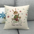 Detail of linen cushion cover with bunny riding a bicycle and Happy Easter Day text - 45x45cm / Cycling Rabbit Illustration (11)