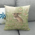 Detailed texture of linen Easter pillow cover with bunny and daisies on grey sofa - Daisy Field Brown Hare Style (19)