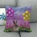 Close-up of Easter linen pillowcase with rabbit, balloons and flowers on a grey sofa - Dreamy Flower Rabbit (12)
