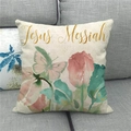 Close-up of linen pillow cover with Jesus Messiah gold text and floral pattern - 18x18 Inch / Religious Text Floral Style (9)