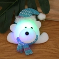LED glowing Christmas polar bear badge pin with blue sequin hat on wooden background - Colorful New Glowing Bear Style