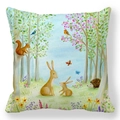 Detail of soft peach skin cushion cover featuring watercolor rabbit and forest animals - 18x18 Inch / Pattern 7 (A Day in the Forest Illustration)