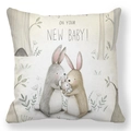 Detail of soft peach skin cushion cover with watercolor bunnies and new baby greeting - 18x18 Inch / Pattern 26 (Warm Bunny Family Hug)