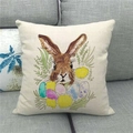 Linen Easter pillowcase with bunny, colorful eggs and yellow dandelions on gray sofa - Easter Egg Rabbit (10)