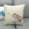 Linen pillowcase with watercolor bunny and dragonfly print on grey sofa background - Rabbit and Dragonfly (14)