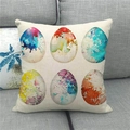 Close-up of Easter linen pillow cover with watercolor egg print on a grey sofa - 18x18 Inch / Six Matrix Art Eggs (8)
