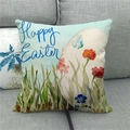 Linen Happy Easter pillowcase with floral eggs on a grey sofa for home decor - Watercolor Floral and Egg Pattern (15)