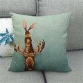 Detailed macro view of the textured linen Easter pillowcase on a grey sofa - Style 2 Antler Rabbit