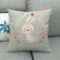 Detail of linen pillowcase with cute bunny and floral wreath pattern on green background - Style 11 Blush Long Eared Rabbit