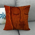 Detail of artistic Buddha head print on textured linen pillow cover on a grey sofa - Buddha Head Artistic Painted Style (2)