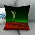 Close-up of linen cushion cover with space landscape on a grey fabric sofa - Red Rock and Green Planet (2)