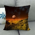 Linen cushion cover with galaxy and cosmic scenery on a gray fabric sofa - Orange Planet and Golden Mountains (3)