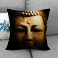 Close-up of linen cushion cover with Shakyamuni Buddha face print on gray sofa - Wood Carving Texture Buddha Face Style (4)