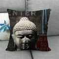 Close-up of square linen pillowcase with Buddha statue print on a grey sofa - 45x45cm / Modern Street Zen Buddha (15)