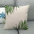 Close-up of linen throw pillow cover with green tropical palm leaf print on a gray sofa - Pattern 2(2) / 18x18 Inch