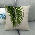 Detailed macro view of green palm leaf print on linen throw pillow case on a sofa - Pattern 5(5) / 18x18 Inch