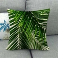 Detail of tropical green palm leaf pattern on linen pillow cover on a grey sofa - Pattern 6(6) / 18x18 Inch