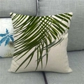 Linen pillowcase with green tropical palm leaf print on a gray fabric sofa - Pattern 7(7) / 18x18 Inch