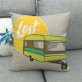 Close-up of linen pillowcase with retro green camper van and lost text on a sofa - Green Camper Lost (11)