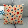 Detailed texture of linen pillowcase with vintage red and blue star patterns on sofa - 45x45cm / Vintage Distressed Red Blue Stars (13)