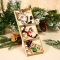 Set di tre ornamenti natalizi in legno con Babbo Natale e renne in una scatola di legno - Versione Bambola