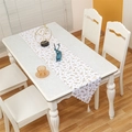 Detail of white Christmas table runner with gold tree patterns and elegant fringe - Gold Tree