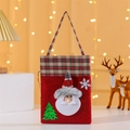 Weihnachtliche Geschenktüte aus rotem Filz mit Weihnachtsmann und karierten Griffen - Weihnachtsmann