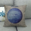 Detailed view of linen cushion cover featuring Neptune planet design on a grey sofa - Neptune Pattern (5)
