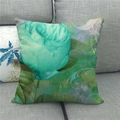 Close-up of a square linen cushion cover with vivid turquoise rose print on a grey sofa - Turquoise Rose Style (2) / 18x18 Inch