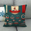 Detail of independence day linen pillow case on a grey sofa with vintage stamp patterns - Dark Green Vintage Medal Style (6)