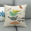 Detail of linen cushion cover showing birds and mushrooms with Flock Together text - Tri-color Birds Stacked on Red Mushroom (3)