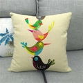 Detailed macro view of the linen texture and cartoon bird prints on a square cushion cover - Four Vertically Stacked Cartoon Birds (11)