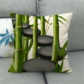 Detailed texture of linen cushion cover featuring green bamboo and Zen stones on a sofa - 45x45cm / Zen Style Green Bamboo and Stones (14)