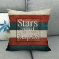 Close-up of American flag style linen pillowcase with red stripes on a grey sofa - 18x18 Inch / Stars And Stripes Deep Red (4)