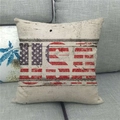 Detail of USA star and stripes linen pillow cover on a gray fabric sofa in home setting - 18x18 Inch / USA Letters Flag (15)