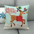 Christmas reindeer linen pillow cover with Merry Christmas text on a gray sofa - 45x45cm / Light Blue Christmas Reindeer (7)
