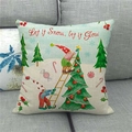 Detail of Christmas gnome pillow cover with Let it Snow text on a grey sofa background - 45x45cm / Nordic Gnomes Series (8)