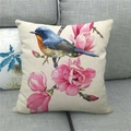 Detail of linen pillowcase with watercolor bird and magnolia flower painting on sofa - Blue Orange Bird With Magnolia (7)