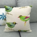 Detail of linen texture and colorful bird print on square throw pillow cover on sofa - Four Colorful Songbirds (12)