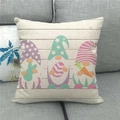 Detail of linen pillowcase featuring Easter gnomes on a grey sofa for home decor - Standard Square