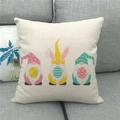 Macro detail of Easter gnome linen pillowcase on grey sofa showing fabric texture - Standard Square