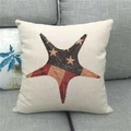 Close-up of star pattern on linen pillowcase with retro red and brown patch design - Vintage Collage Starfish (11) / 45x45cm